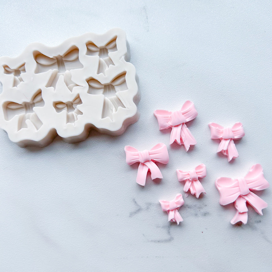 COQUETTE BOW MOLD